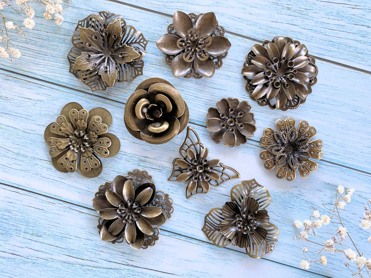 FIVE distressed metal flowers for crafts, jewelry
